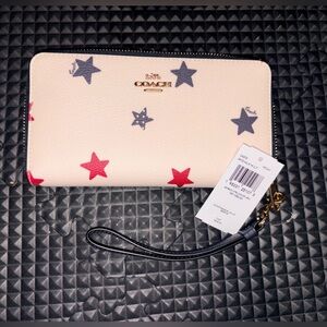 Coach Cream Wristlet with Red and Blue Stars